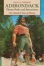 Text: "Sally E. Svenson, Adirondack Theme Parks and Attractions, One Hundred Years of History."  
Große Statue von Paul Bunyan mit Kindern.