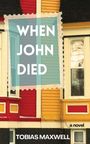 "When John Died", Tobias Maxwell. Bunte Hausfassade, rotes und gelbes Holz, weiße Fensterrahmen.