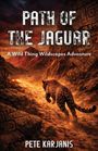 Texte: "Path of the Jaguar", "A Wild Thing Wildscapes Adventure", "Pete Karjanis". Ein Jaguar rennt auf einem Pfad in einer felsigen Landschaft.