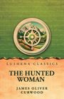 LUSHENA CLASSICS, THE HUNTED WOMAN, JAMES OLIVER CURWOOD. Illustration: Kompass vor Bergen, grüne und beige Farben.