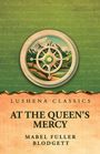 Texte: LUSHENA CLASSICS, AT THE QUEEN'S MERCY, MABEL FULLER BLODGETT. Illustration: Steuerrad mit Bergen im Hintergrund.