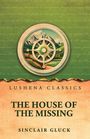 "Lushena Classics, The House of the Missing, Sinclair Gluck" - Kompass-Illustration vor Berglandschaft.