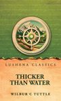 Oben „Lushena Classics“ und unten „Thicker Than Water, Wilbur C Tuttle“. Illustration: Kompass vor Berglandschaft.