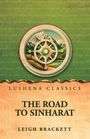 "Lushena Classics", "The Road to Sinharat", "Leigh Brackett". Illustration: Kompass und Berglandschaft.